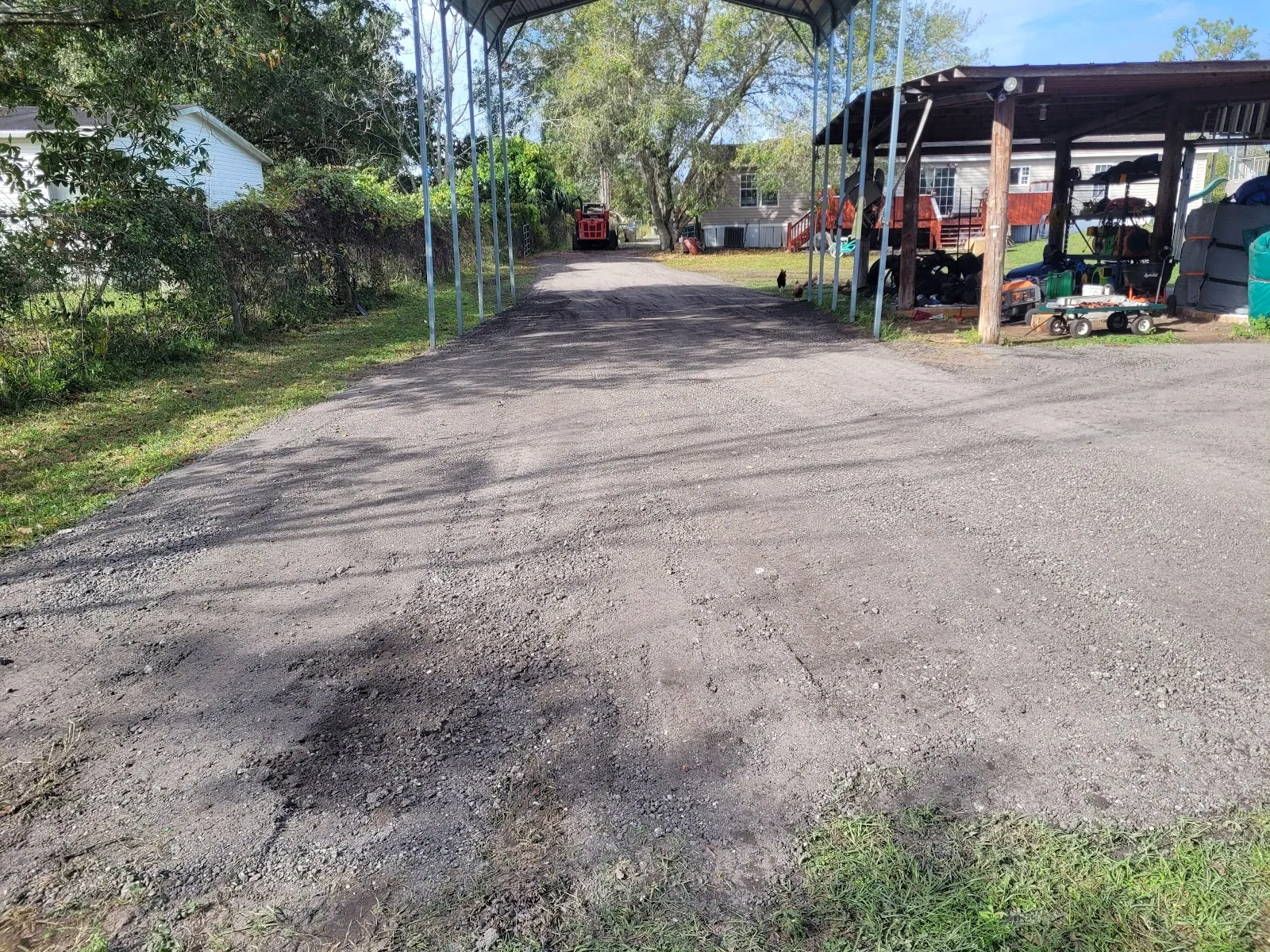 Driveway graded with the SCJ track loader in Osceola County