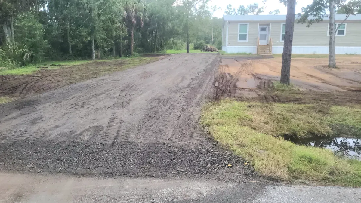 New driveway with asphalt millings at a home in St. Cloud, FL