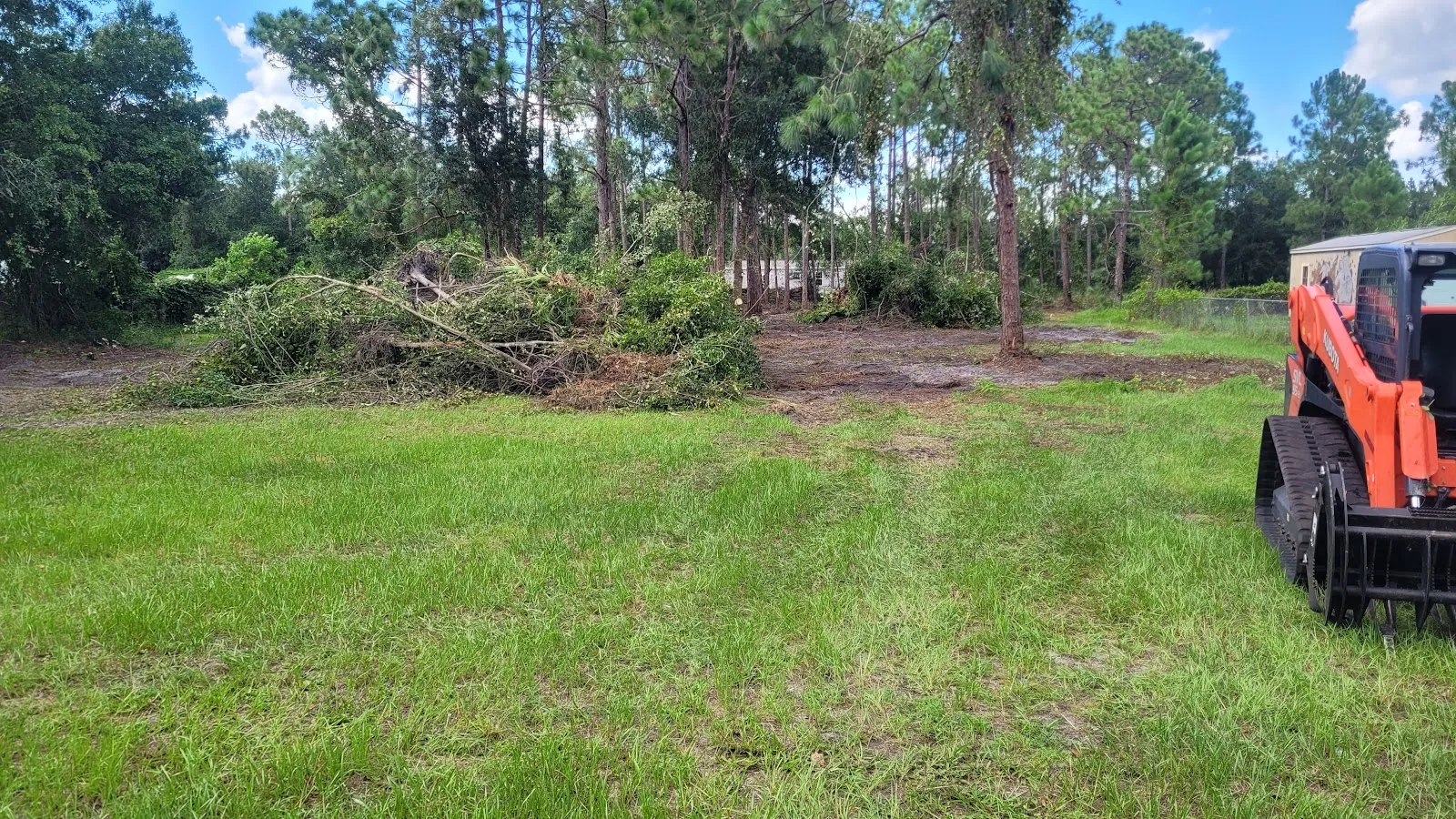 Overgrown lot being cleared near St. Cloud, FL